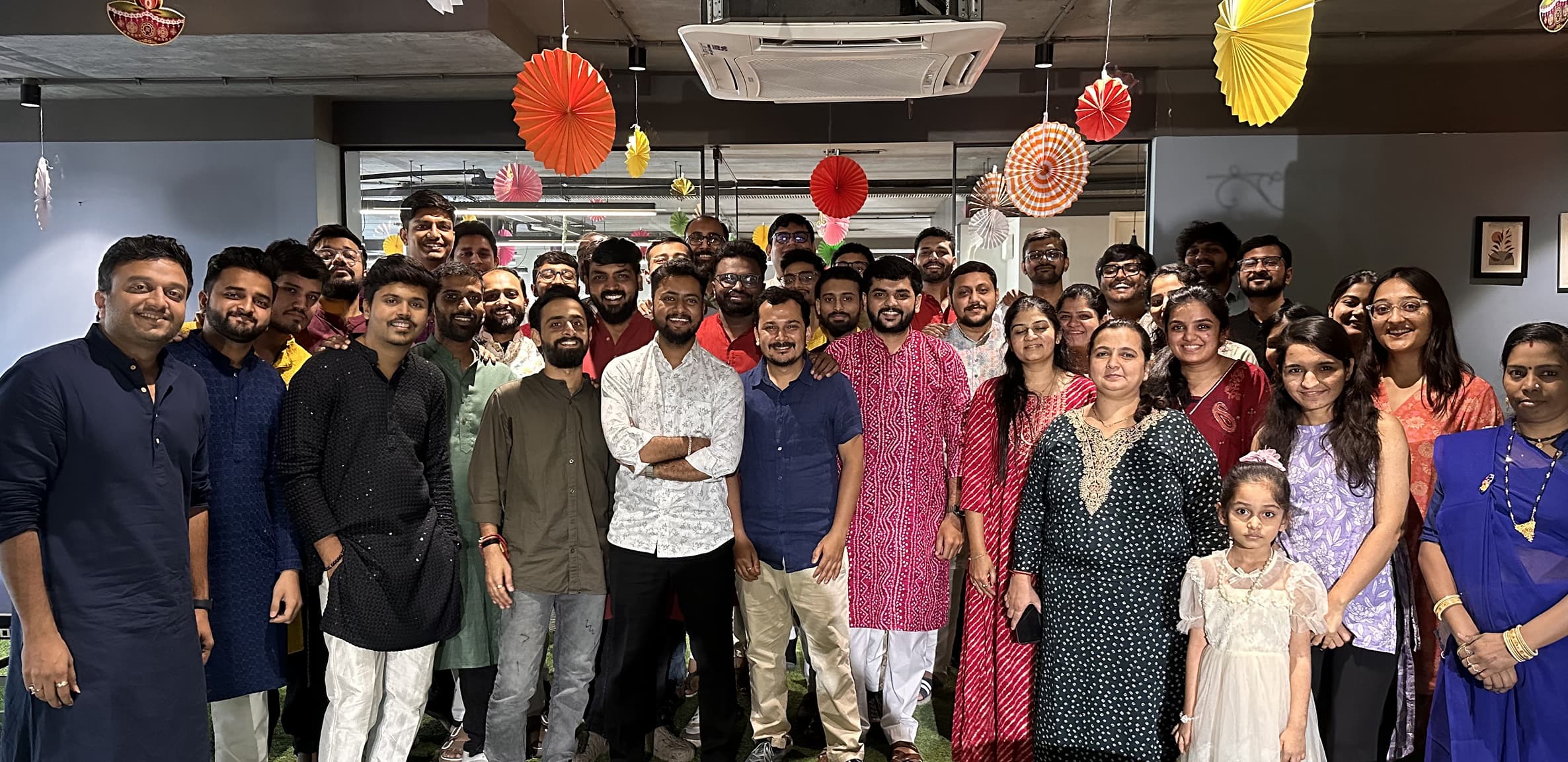 Festive Team Photo in Traditional Wear